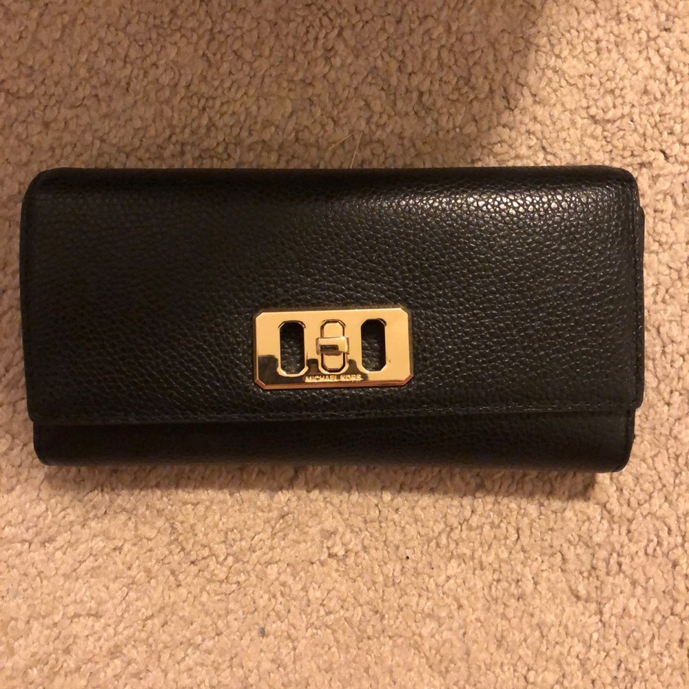 Black trifold Michael Kors wallet